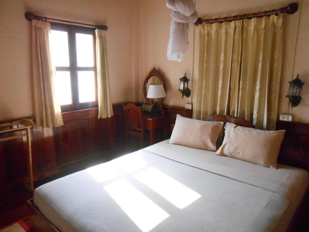 Thida Guesthouse Luang Prabang Værelse billede